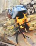 Antique kettle on brick stove