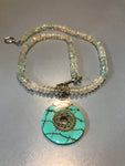Crystal beaded neck piece with a turquoise pendant